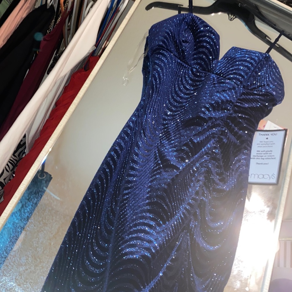 Dark blue glittery dress. Never worn, let me know if interested:)